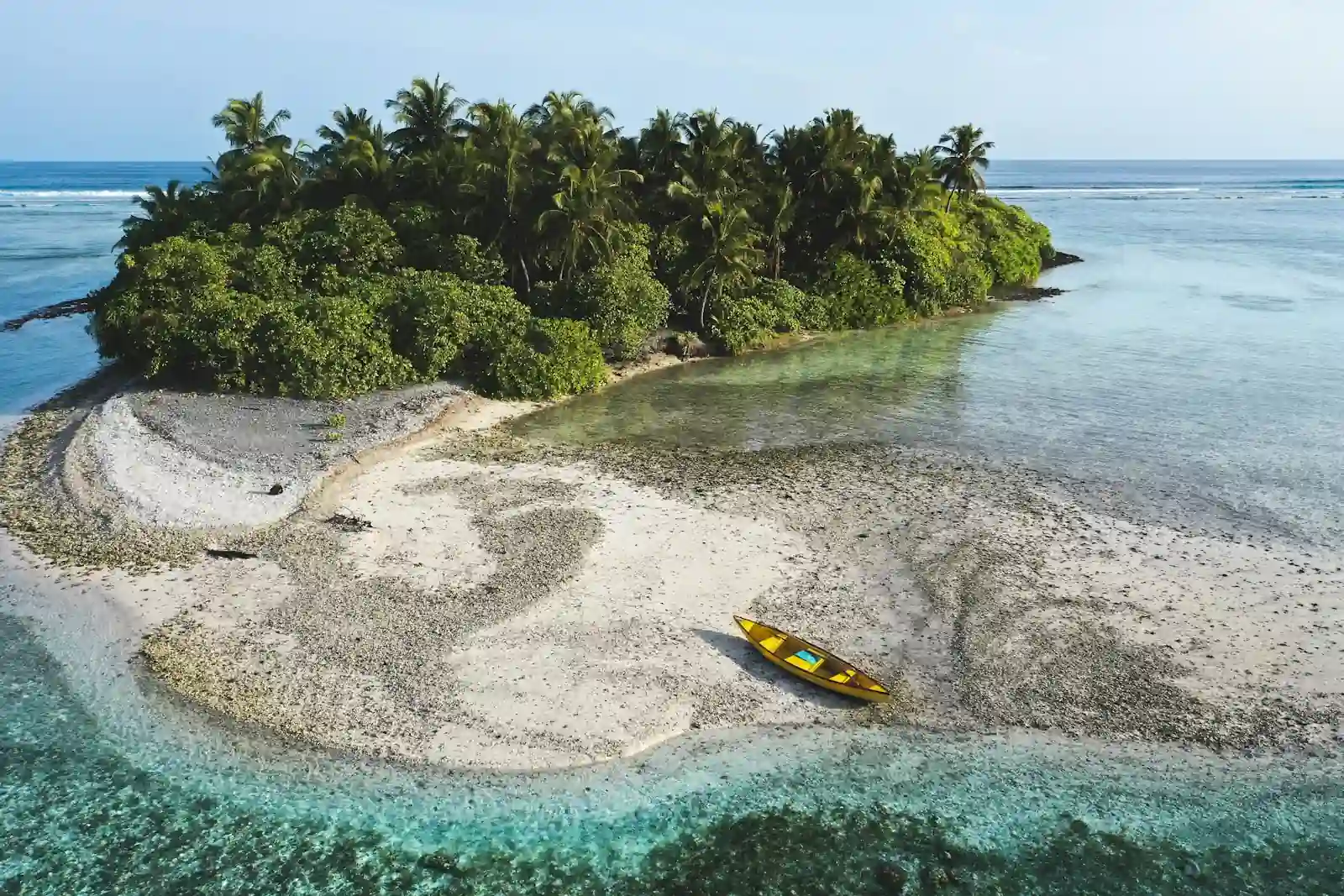 Traditional boat on the shore in the Playgrounds area, northern Mentawai