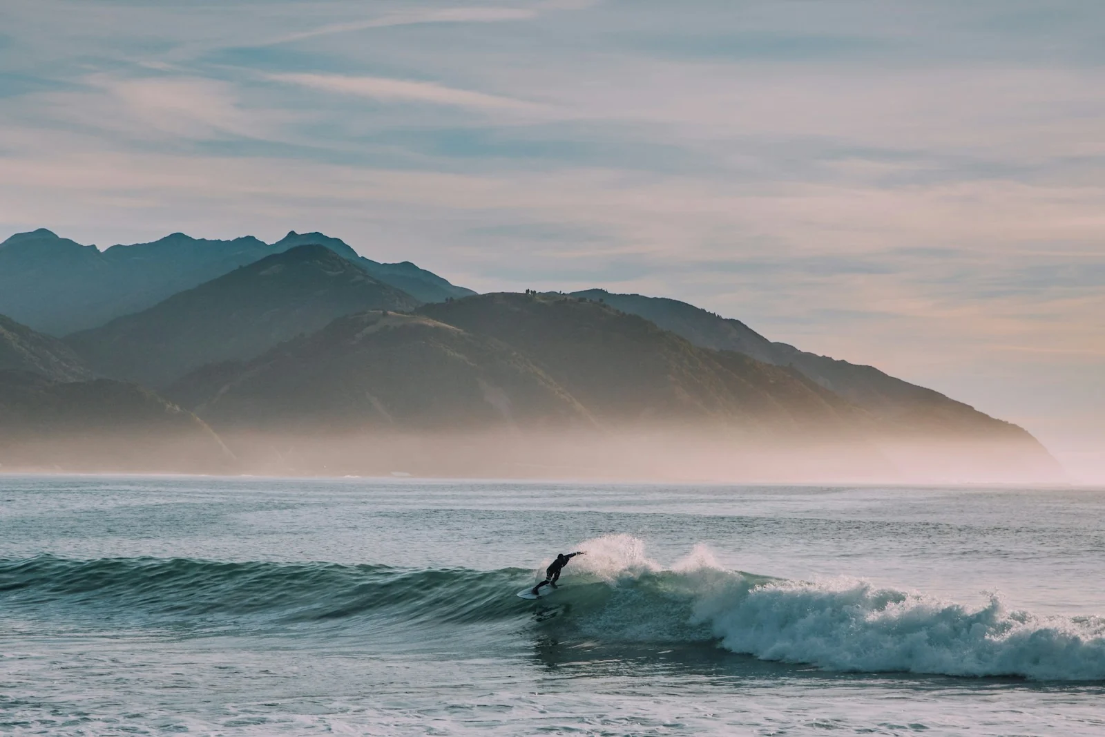 Intermediate surfer carving a wave in the Mentawai Islands